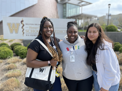 Albion 4+4 Program Students Chetachi Agunanne, Cindy Avila, and Niya Martin,