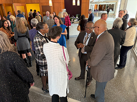 J. Adrian Tyndall, MD, MPH, FACEP, The Hal B. Jenson, MD Dean, President and CEO - WMU Homer Stryker M.D. School of Medicine, speaks with attendees at the "Evening with the Dean" event on March 19, 2026.