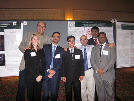 Mark Loehrke, MD, with Internal Medicine residents at Research Day, circa 2010