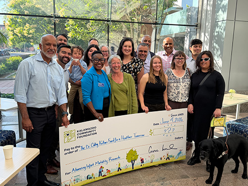 Cathy Kothari, PhD, honored for her tireless work to address infant mortality in Kalamazoo during surprise celebration at the Kalamazoo Community Foundation