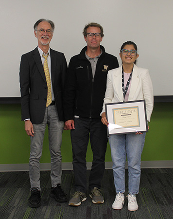 Lavanya Sharma, participant in WMed Science Research Enrichment Program 2026 cohort, with Thomas L. Rothstein, MD, PhD, and Michael Gutknecht, PhD