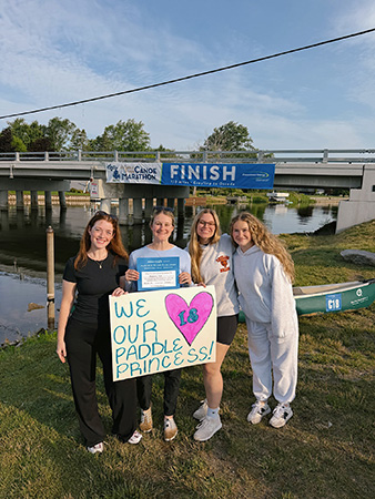 M4 Marina Cox at the conclusion of the race with her three best friends and classmates from WMed – M3 Remy Gerew and M4s Skylar Ketteler and Madeline Yorke